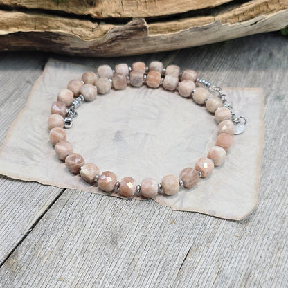 Komplektas iš saulės akmens