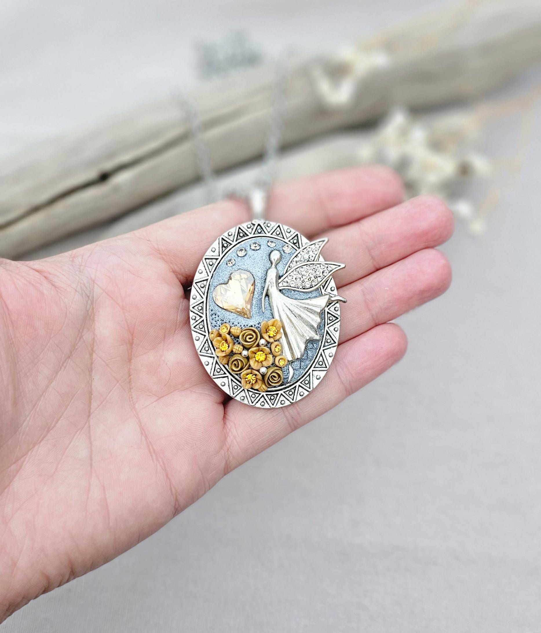 soft gold pendant, fairy locket, floral jewelry, crystal heart necklace, handcrafted pendant, whimsical charm, fairy tale jewelry, unique locket, keepsake necklace, elegant accessory, photo locket, artisan necklace, silver chain pendant