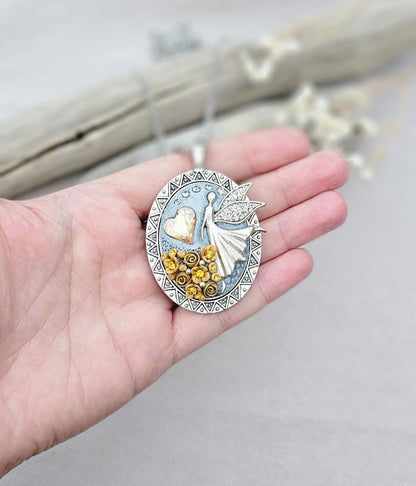 soft gold pendant, fairy locket, floral jewelry, crystal heart necklace, handcrafted pendant, whimsical charm, fairy tale jewelry, unique locket, keepsake necklace, elegant accessory, photo locket, artisan necklace, silver chain pendant