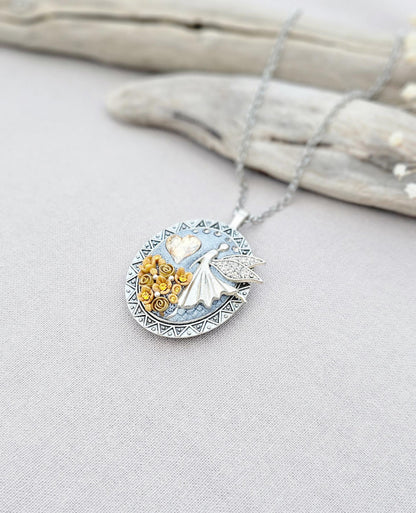 soft gold pendant, fairy locket, floral jewelry, crystal heart necklace, handcrafted pendant, whimsical charm, fairy tale jewelry, unique locket, keepsake necklace, elegant accessory, photo locket, artisan necklace, silver chain pendant