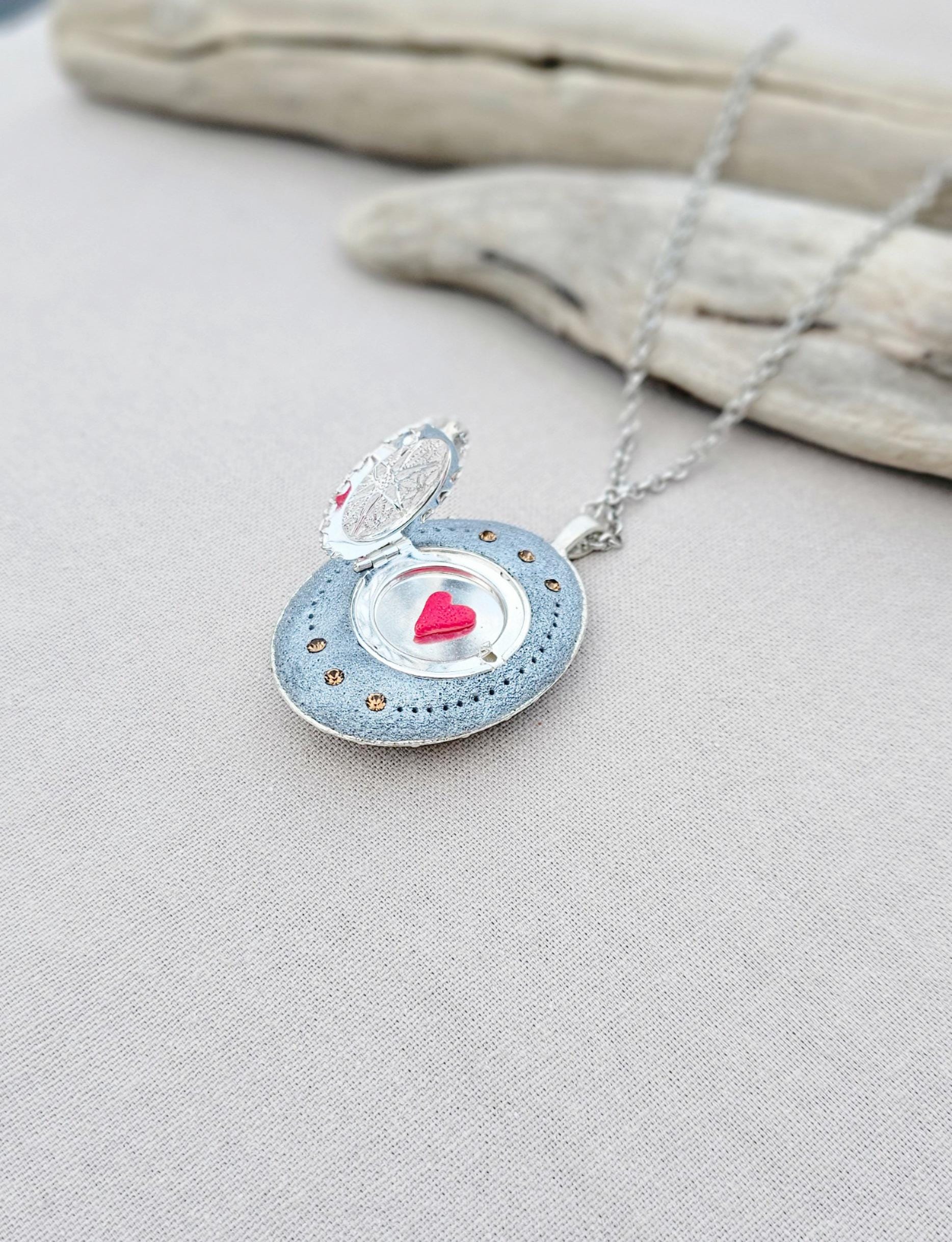 soft gold pendant, fairy locket, floral jewelry, crystal heart necklace, handcrafted pendant, whimsical charm, fairy tale jewelry, unique locket, keepsake necklace, elegant accessory, photo locket, artisan necklace, silver chain pendant