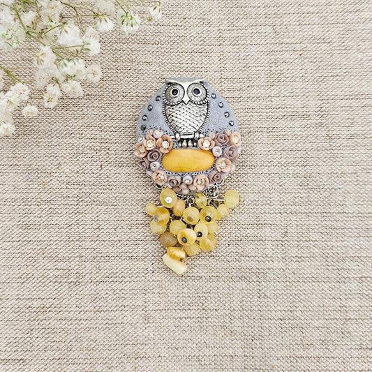 handmade polymer clay brooch with owl and handmade flowers and baltic amber