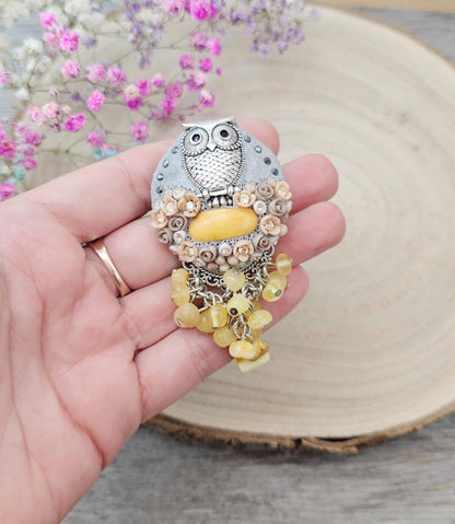 handmade polymer clay brooch with owl and handmade flowers and baltic amber
