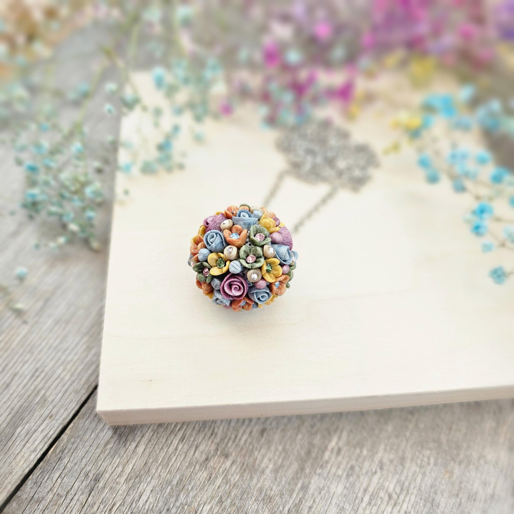 colored pendant made of polymer clay ball
