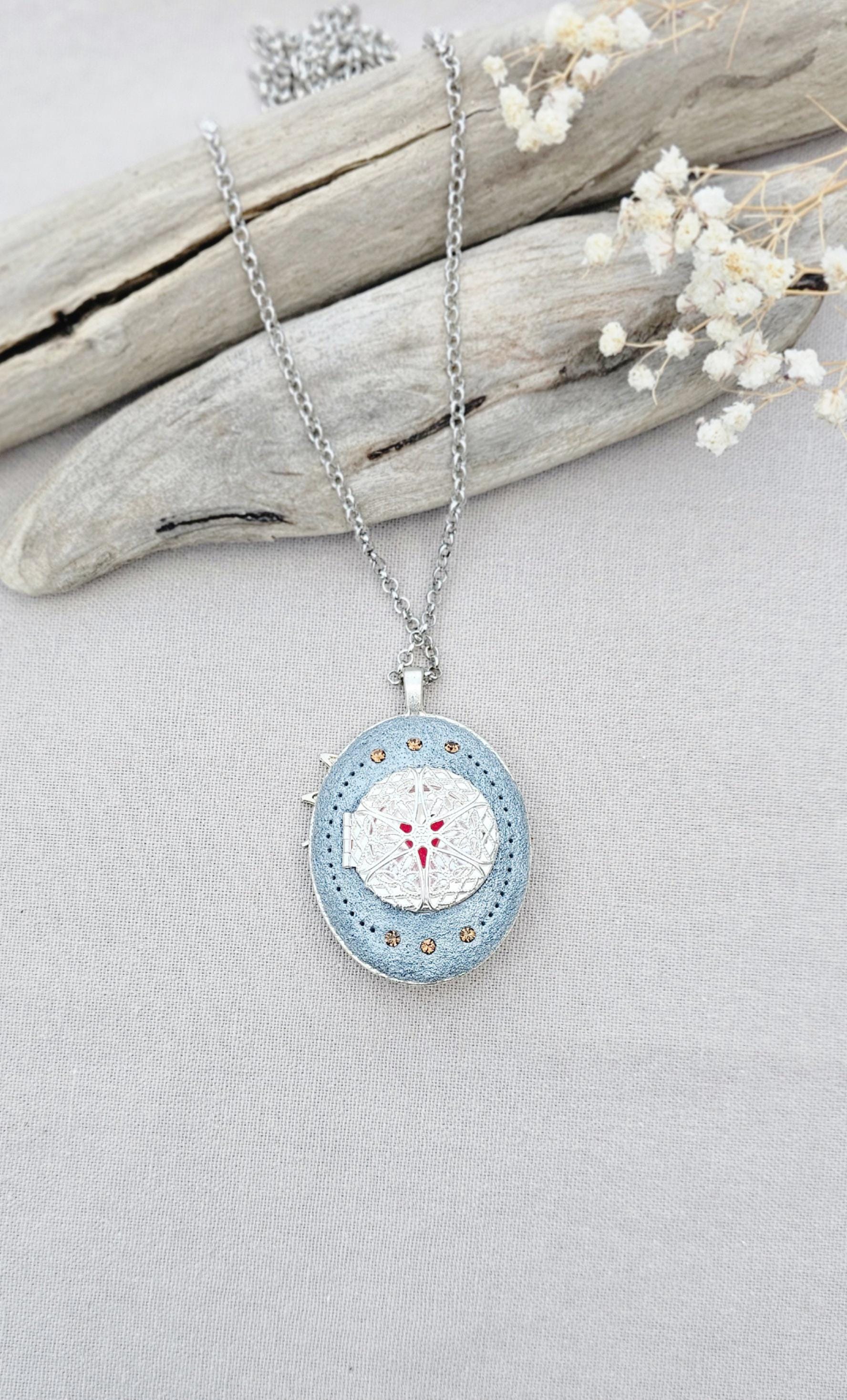 soft gold pendant, fairy locket, floral jewelry, crystal heart necklace, handcrafted pendant, whimsical charm, fairy tale jewelry, unique locket, keepsake necklace, elegant accessory, photo locket, artisan necklace, silver chain pendant