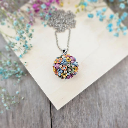 colored pendant made of polymer clay ball