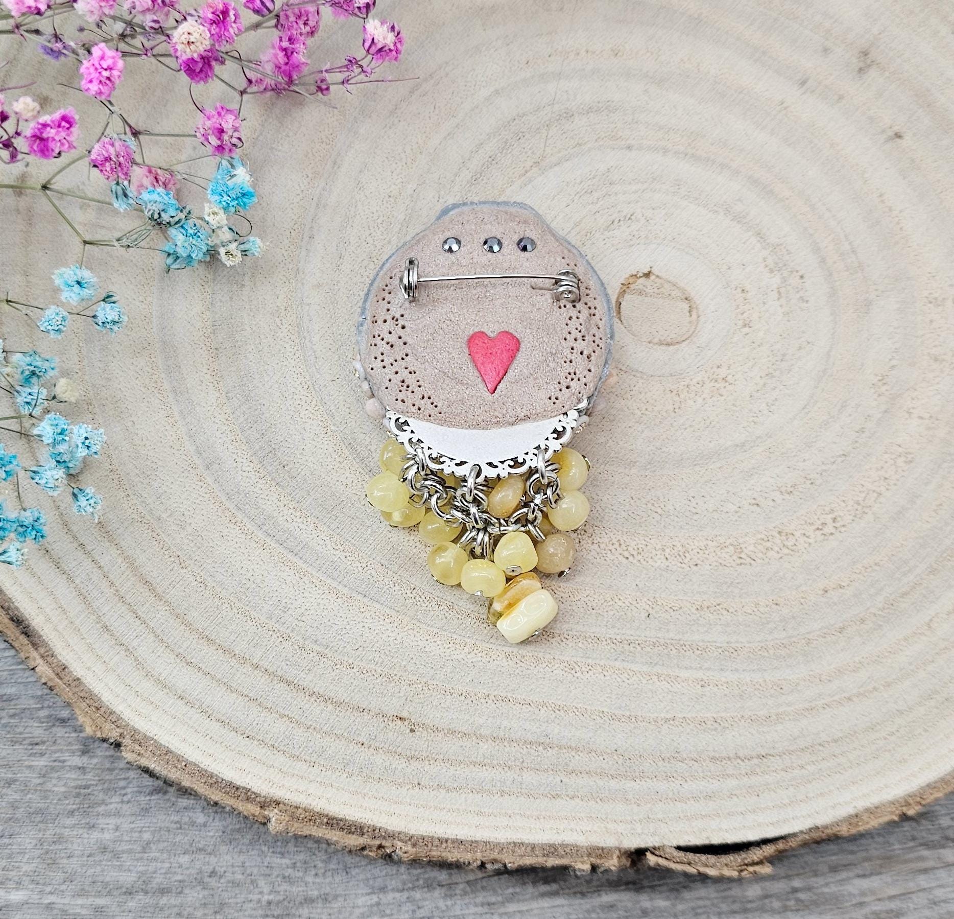 handmade polymer clay brooch with owl and handmade flowers and baltic amber