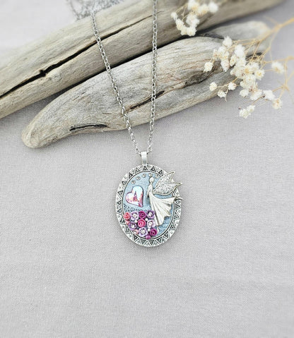 lavender fairy pendant, soft pink locket, fairy jewelry, silver chain necklace, photo locket, aromatic locket, handcrafted flowers, unique gift, whimsical charm, magical necklace, elegant jewelry, fairy tale locket, polymer clay pendant