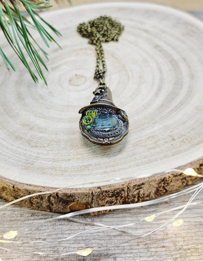 A magical pendant featuring a wizard’s hat, a stunning labradorite stone, and a hidden locket on the other side. Say “Abracadabra” and let your wishes come true!