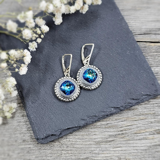 Elegant BLUE dangle earrings with sparkling blue crystals set in metal frames with polymer clay details. Silver hooks. Packaged in a paper gift box. A perfect accessory for any occasion, adding a touch of brilliance and sophistication