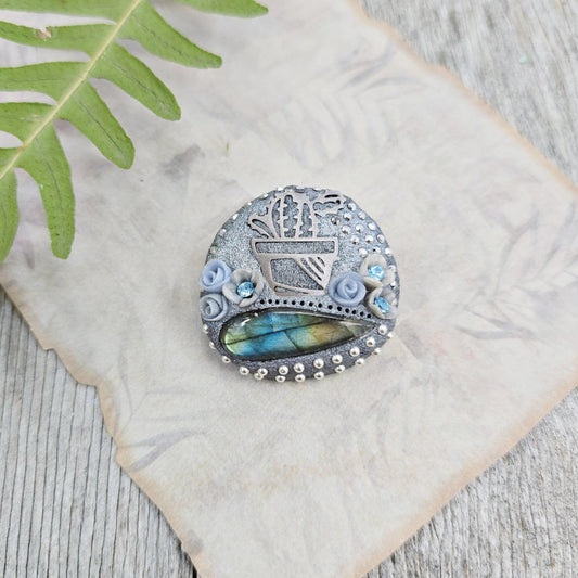 Handmade cactus brooch with shimmering labradorite, crafted from polymer clay and stainless steel – a unique mystical accessory inspired by nature.