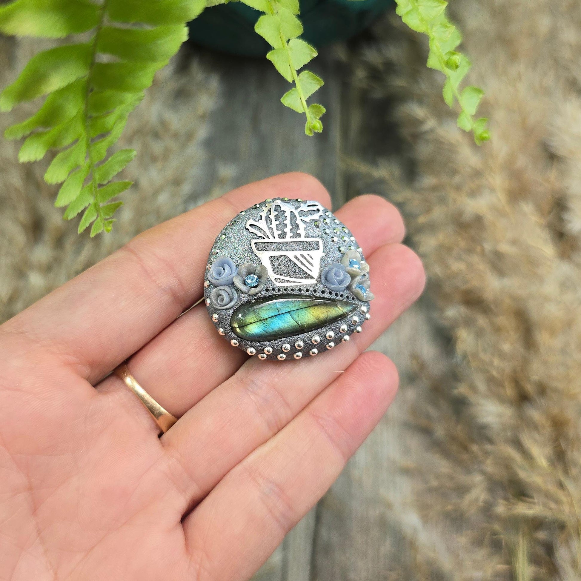 Handmade cactus brooch with shimmering labradorite, crafted from polymer clay and stainless steel – a unique mystical accessory inspired by nature.