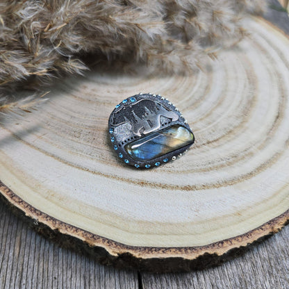 Handmade brooch with labradorite and bear design – polymer clay pin symbolizing strength and protection, unique nature-inspired jewelry.
